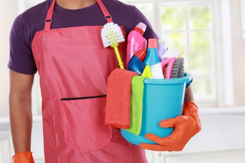Professional house clearance team sorting household items in a home