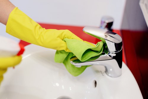 Team member checking service notes after a deep cleaning complaint