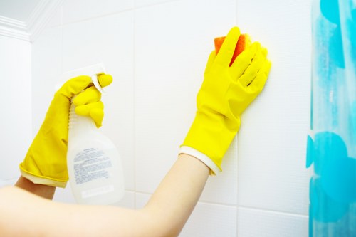 Cleaning company staff maintaining a tidy workspace